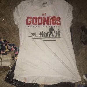 A white “never say die” Goonies movie t-shirt.